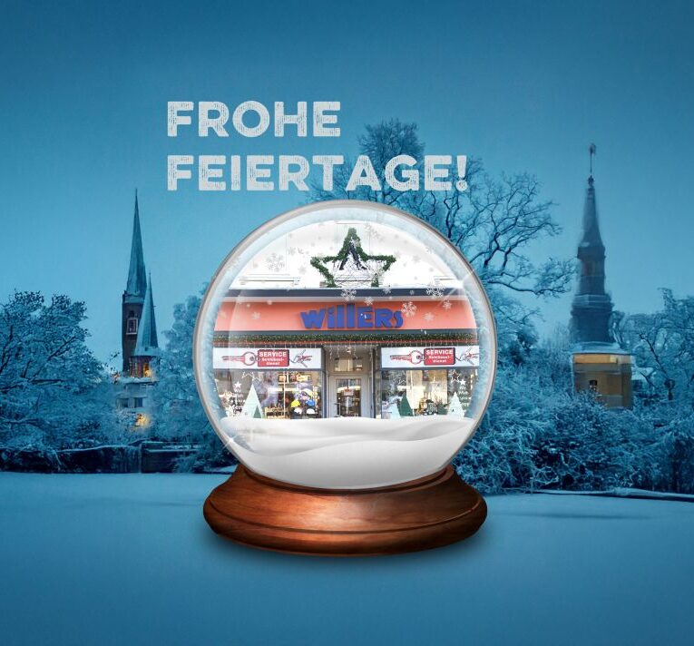 Schneekugel mit Willers-Laden und Text: Frohe Feiertage